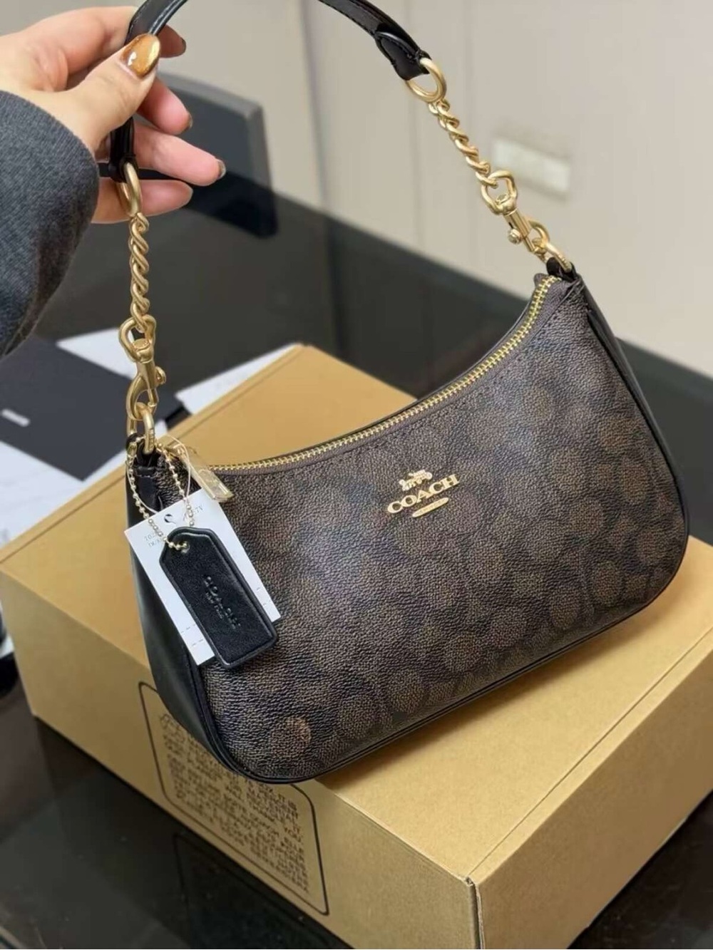 Coach Brown Signature Canvas Shoulder Bag with Black Trim and Gold Hardware